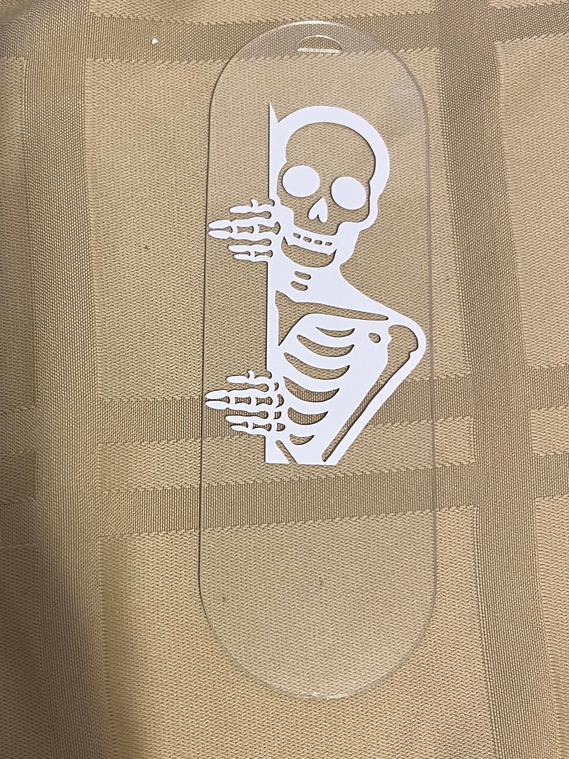 Peak-a-boo skeleton bookmark